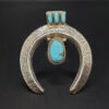 Turquoise Naja horse shoe sandcasted pendant